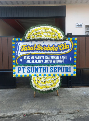 Papan Bunga Duka di Tuyau