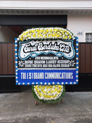 Papan Bunga Duka di Tuyau